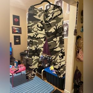 Satiny denim type camo pants.